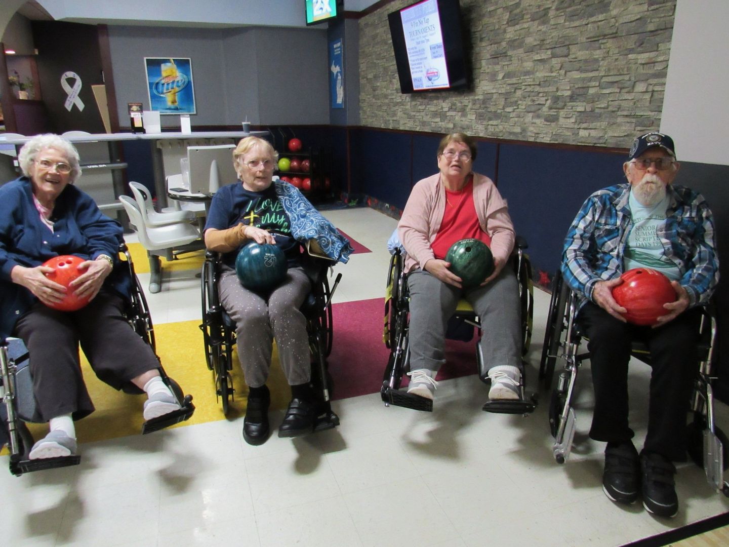 Elders bowling during an outing at Lenawee Medical Care Facility in Adrian, MI