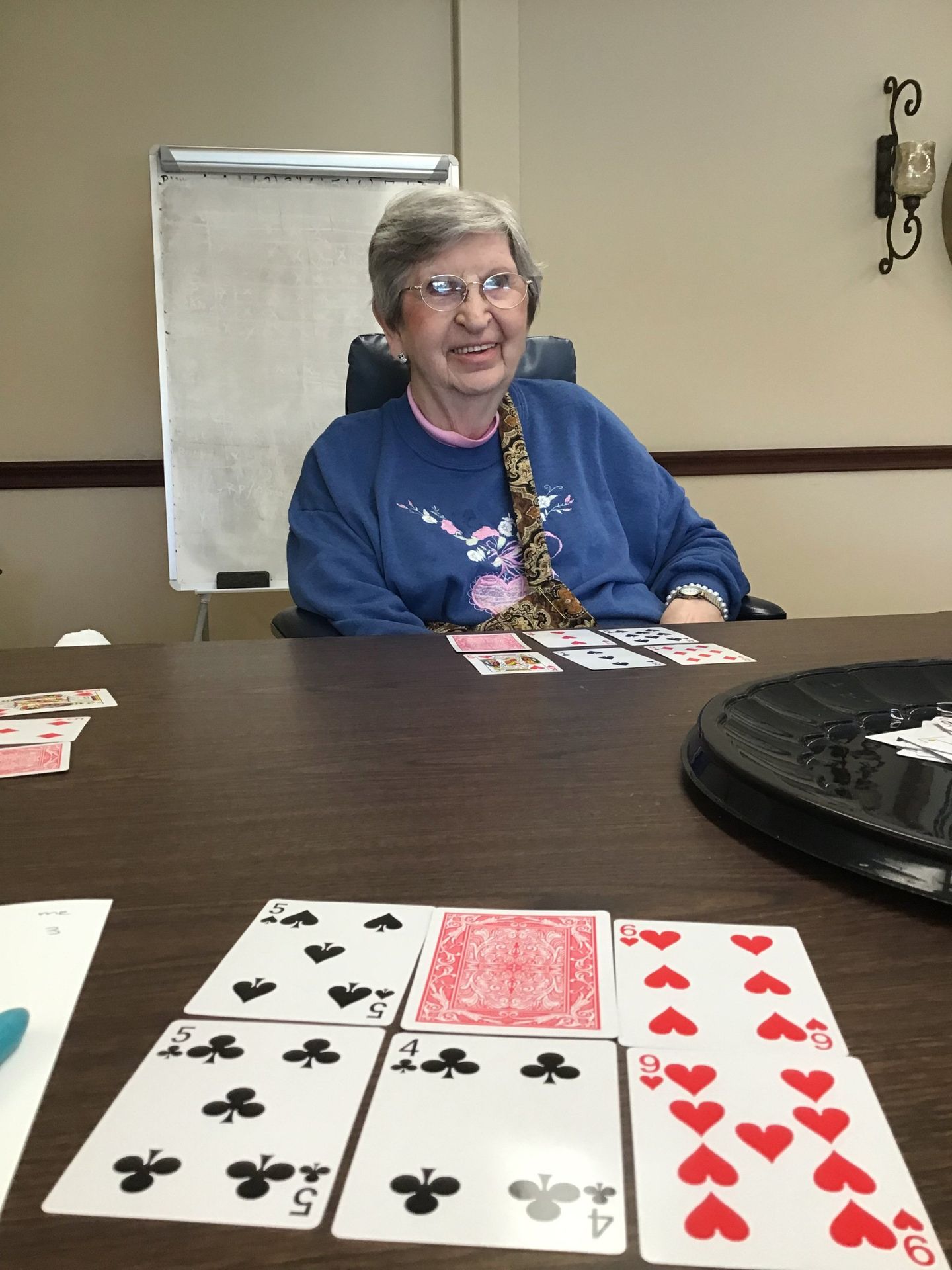 Elder playing cards at Lenawee Medical Care Facility in Adrian, MI