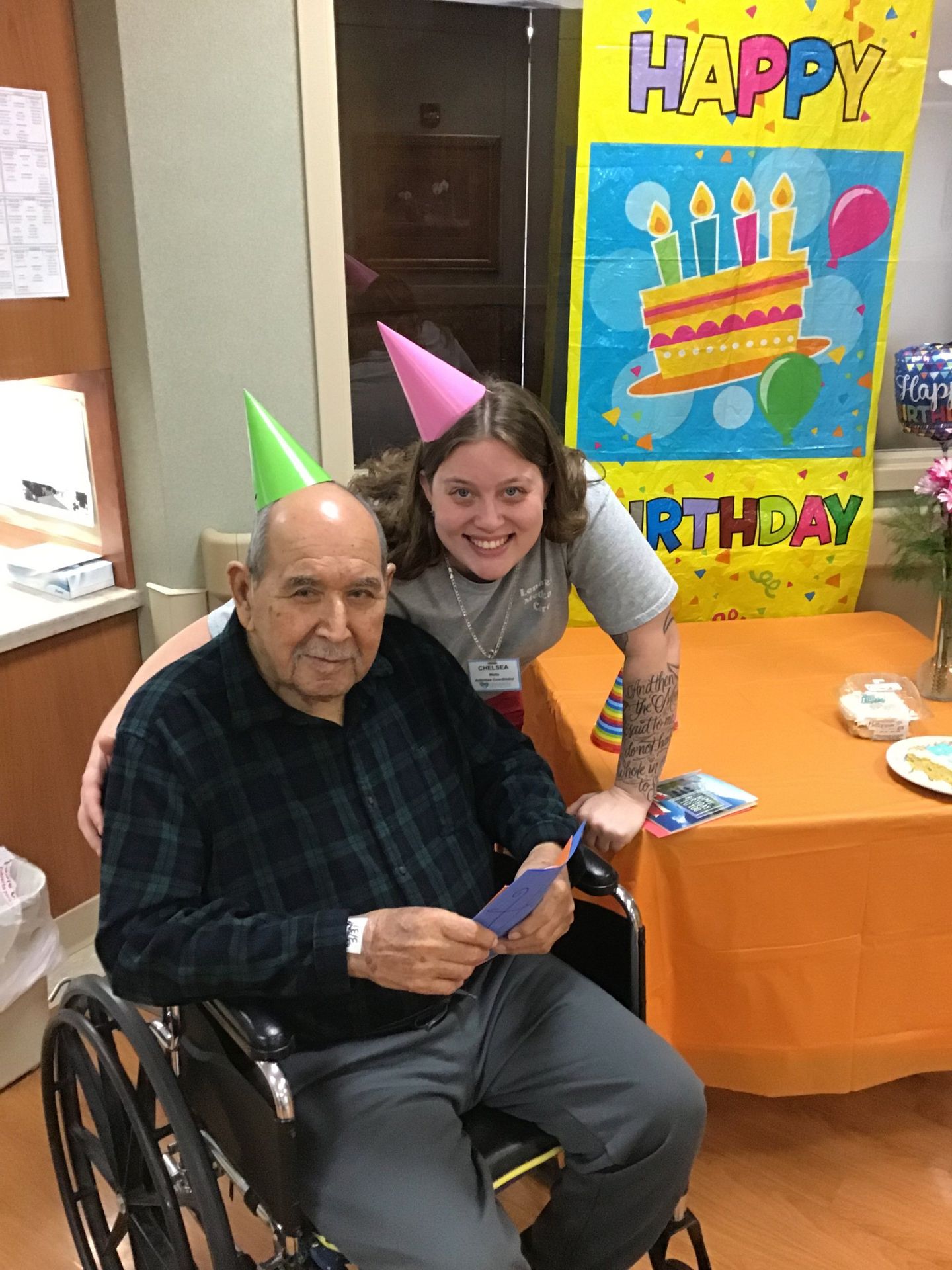 Elder and family member at birthday party at Lenawee Medical Care Facility in Adrian, MI