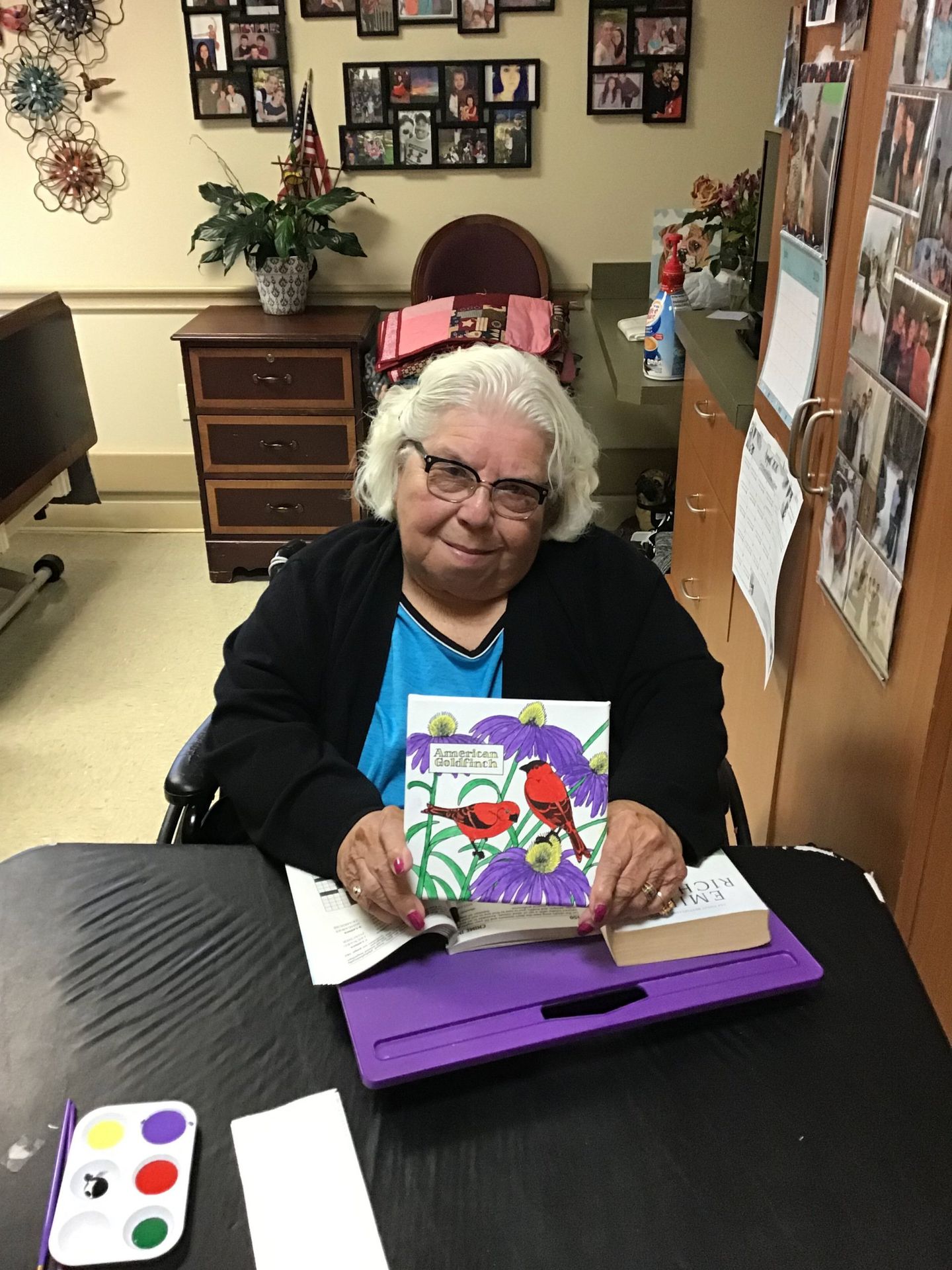 Elder in her room painting at Lenawee Medical Care Facility in Adrian, MI