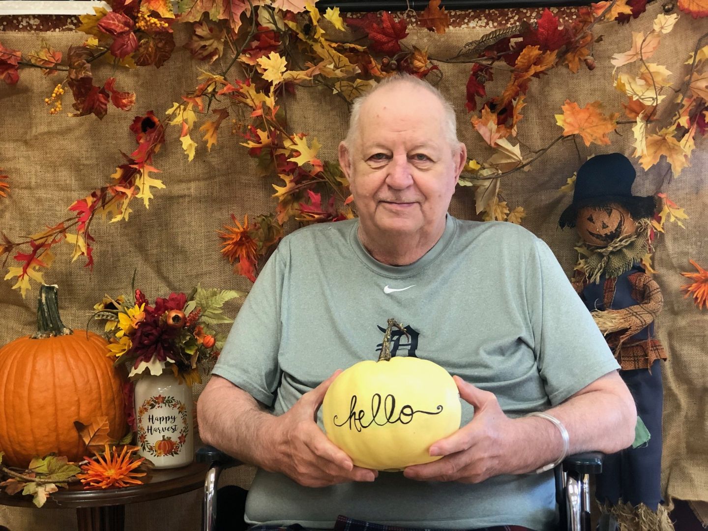 Elder holding decorated pumpkin at Lenawee Medical Care Facility in Adrian, MI
