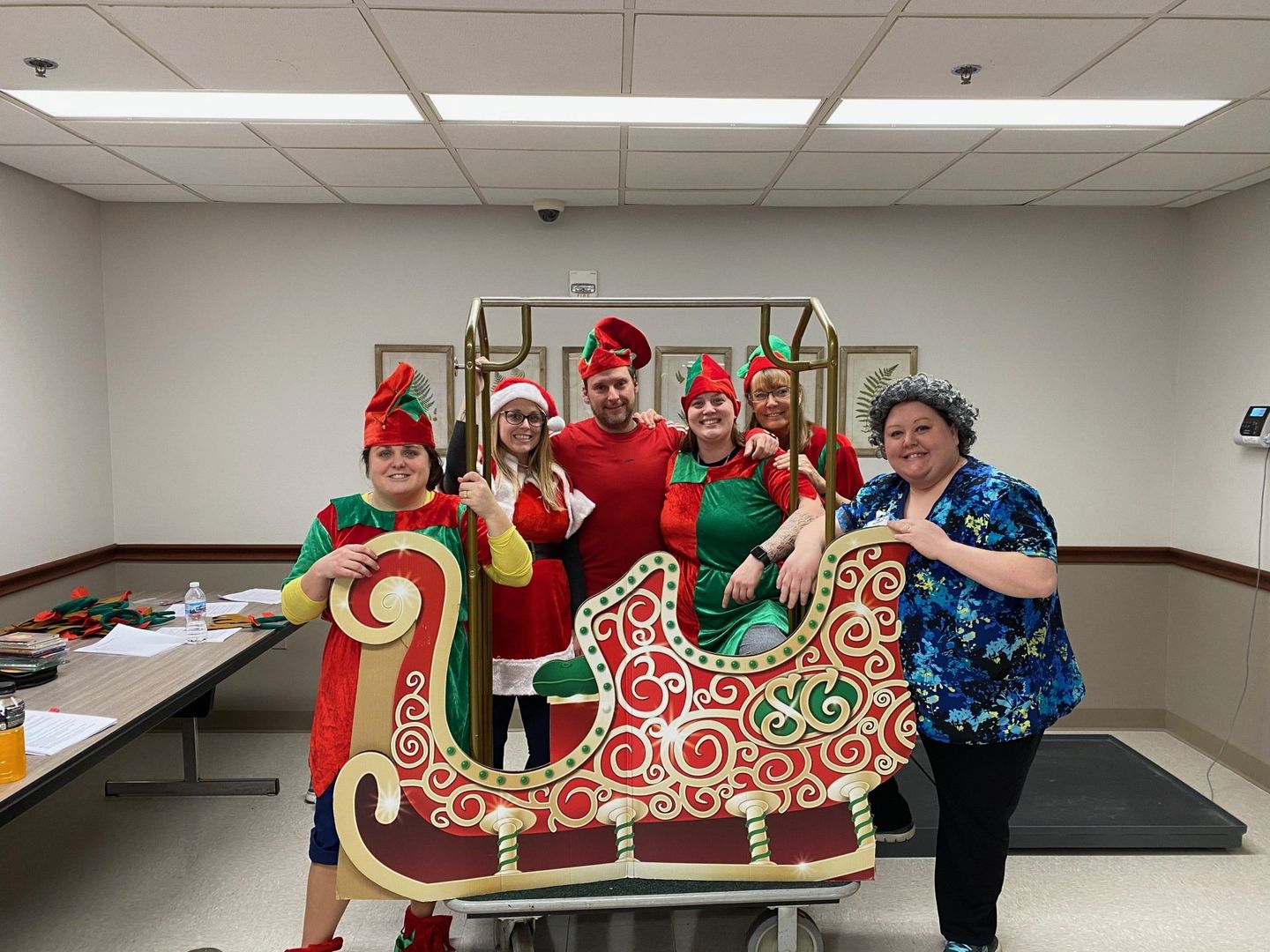 Staff members dressed up as elves and Santa for Christmas at Lenawee Medical Care Facility in Adrian, MI