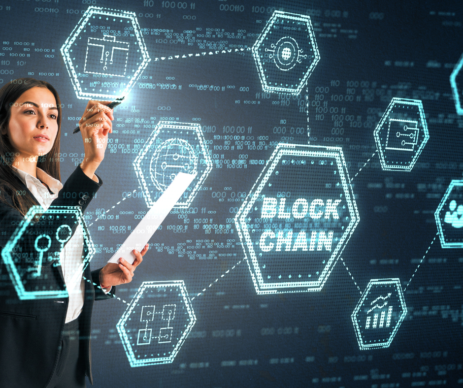 A woman is holding a piece of paper in front of a screen that says blockchain.