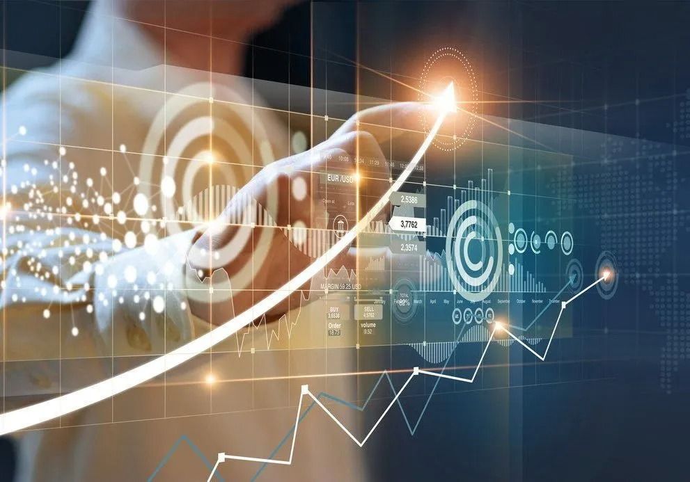 Una mano interactuando con una interfaz digital que muestra gráficos de crecimiento holográficos