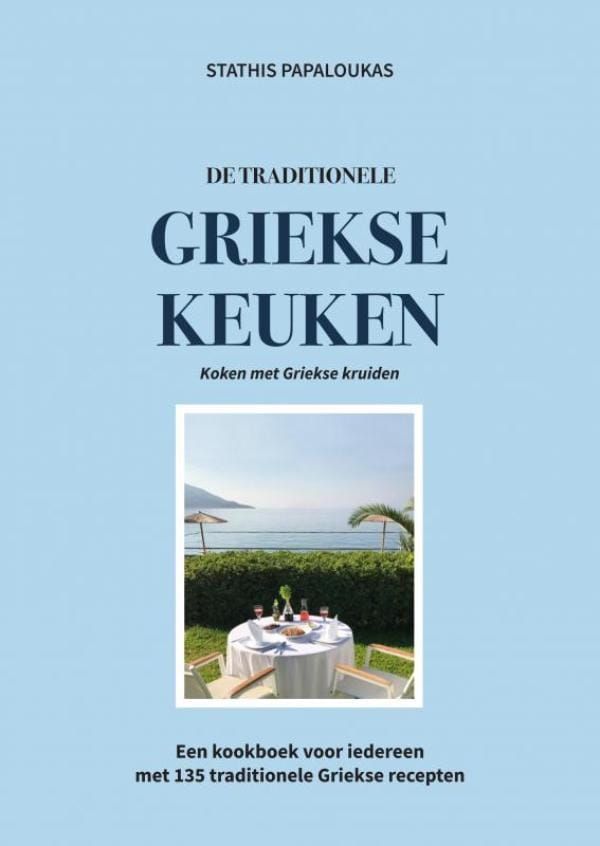 Een boek genaamd griekse keuken heeft een afbeelding van een tafel op de cover