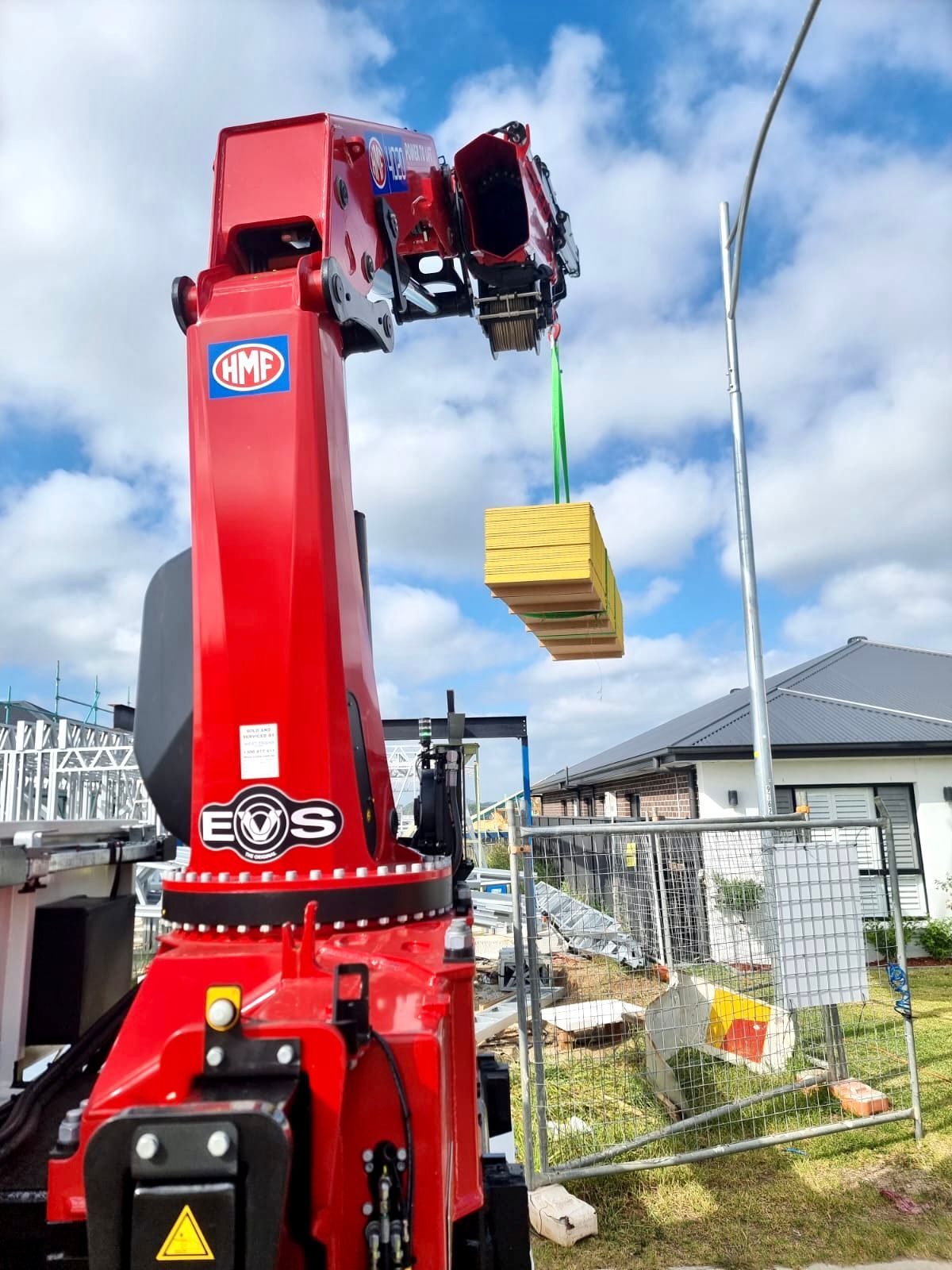 Lifting Yellow Material — Sydney, NSW — Level8 Cranes