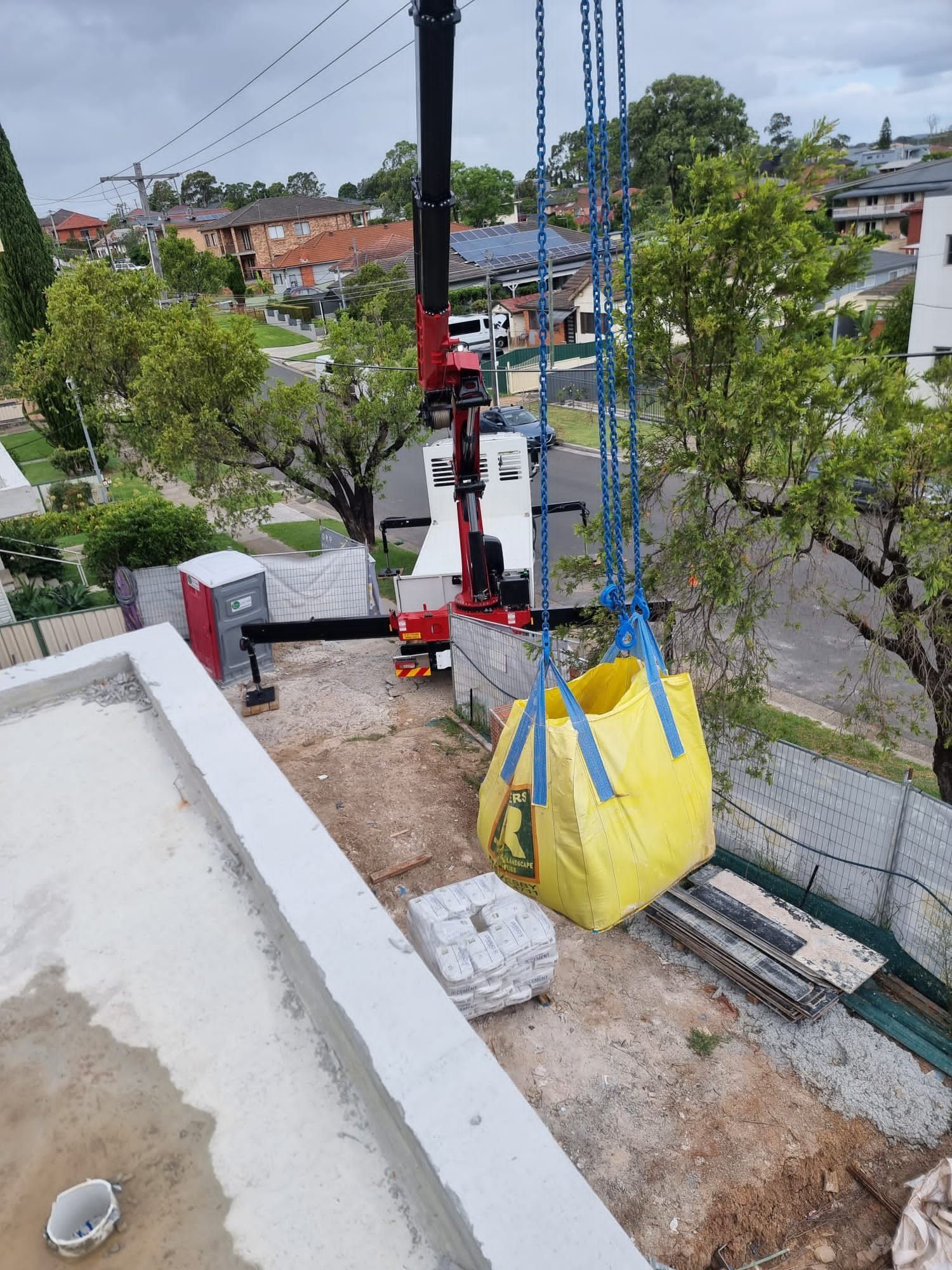 Lifting Sand on Big Yellow Bag — Sydney, NSW — Level8 Cranes