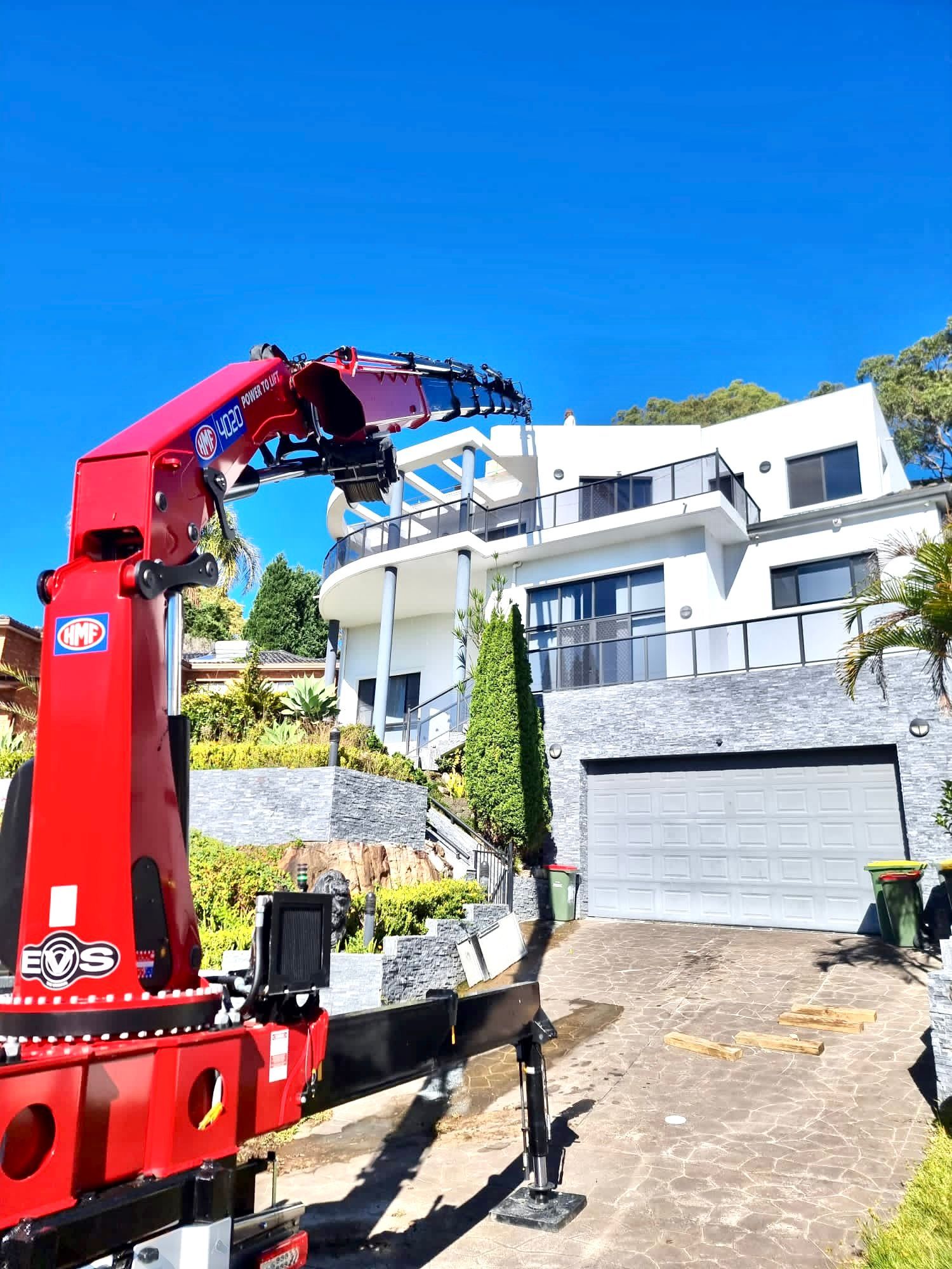 Picking Heavy Appliance on Roof Top — Sydney, NSW — Level8 Cranes