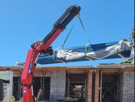 Lifting Blue Roof — Sydney, NSW — Level8 Cranes