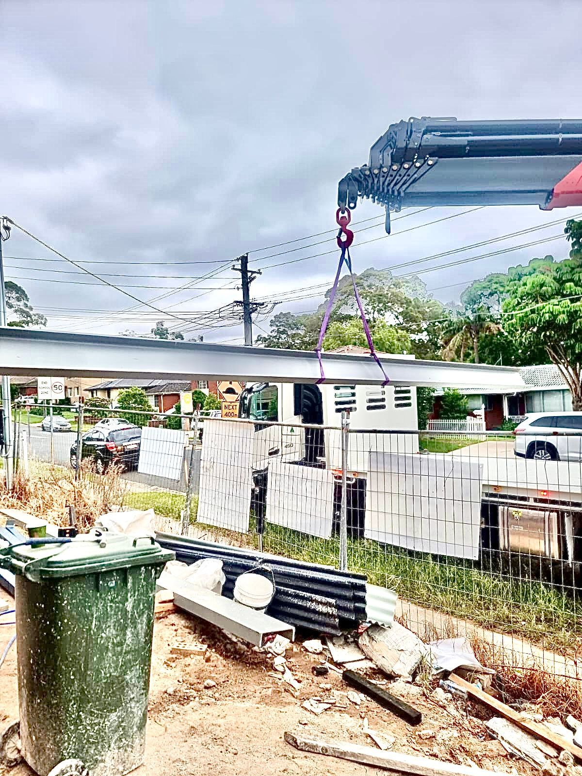 Lifting Steel Bar on Residential House — Sydney, NSW — Level8 Cranes