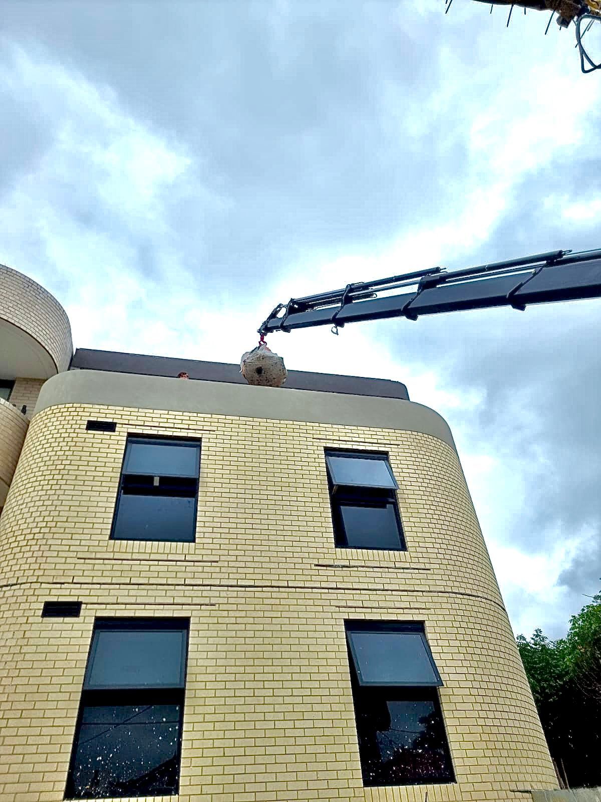 Bringing Down Huge Things on 3rd Floor — Sydney, NSW — Level8 Cranes