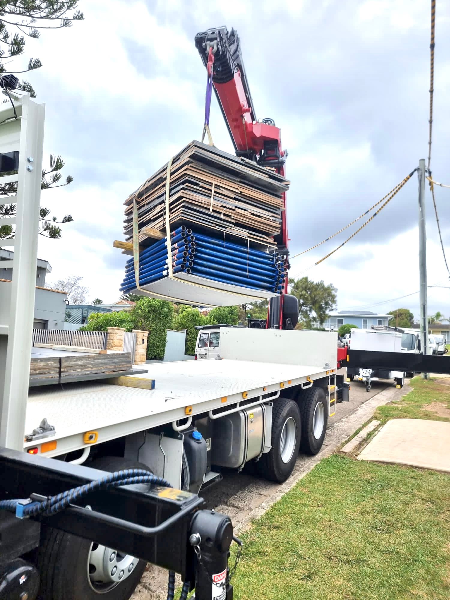 Wood and Metal Unloading — Sydney, NSW — Level8 Cranes