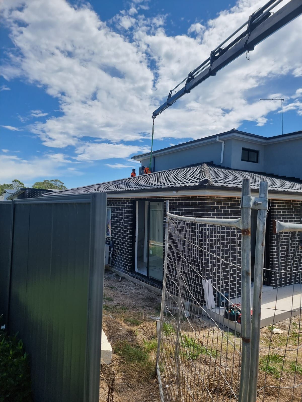 Installing Air Conditioning on Residential House — Sydney, NSW — Level8 Cranes