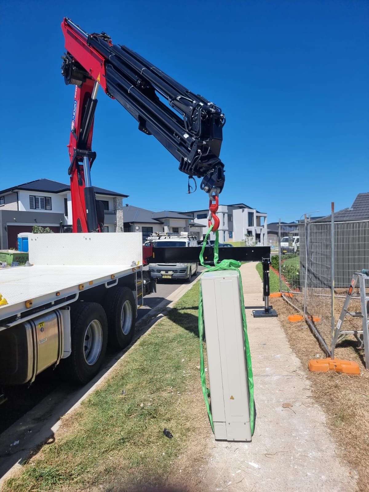 Crane Preparing to Lift the Air Conditioning — Sydney, NSW — Level8 Cranes