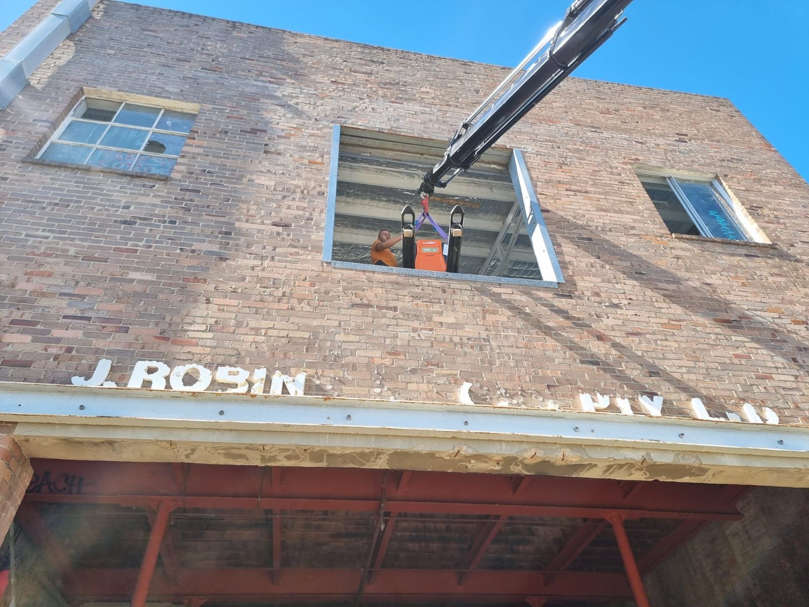 Belmore Lifting on Window — Sydney, NSW — Level8 Cranes