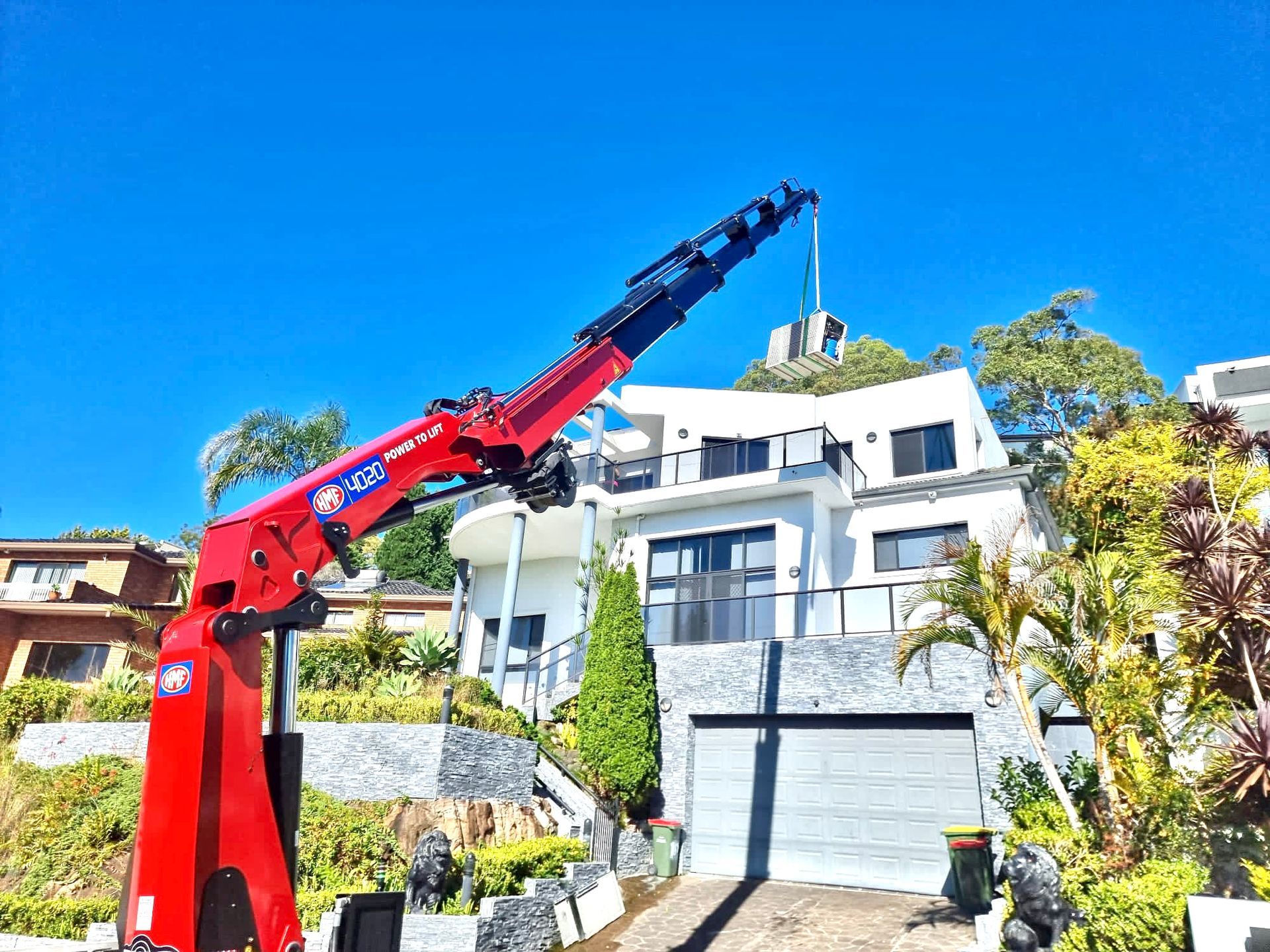 Crane Lifting on Roof Top — Sydney, NSW — Level8 Cranes