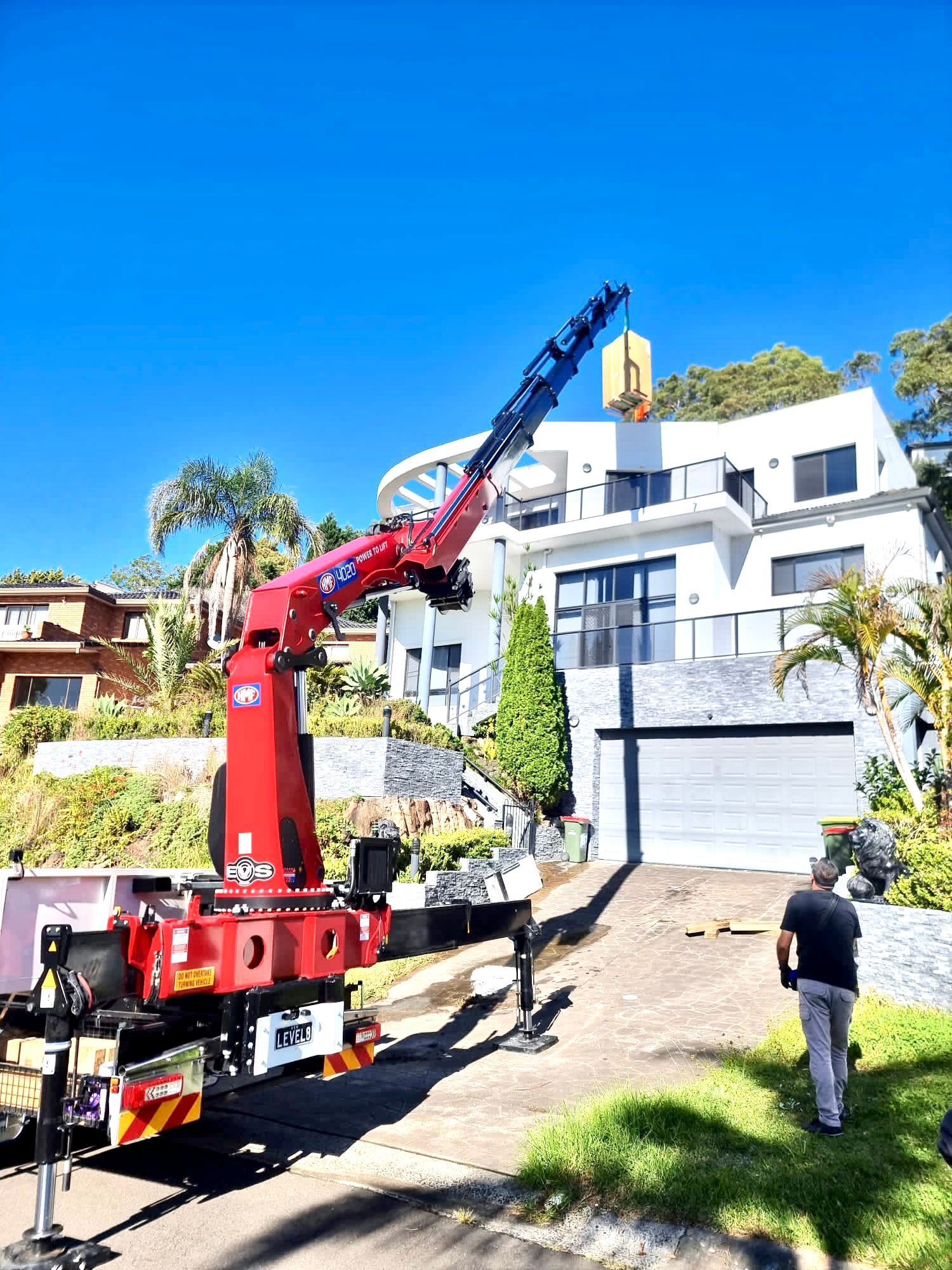 Lifting Yellow Heavy Item — Sydney, NSW — Level8 Cranes