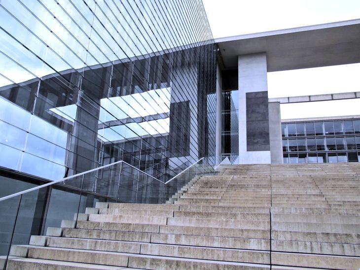 Stairs leading up to a building with the letter e on it. Exterior window cleaning Northville MI.