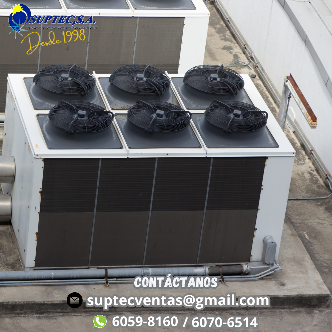 Un gran acondicionador de aire está situado en el techo de un edificio.