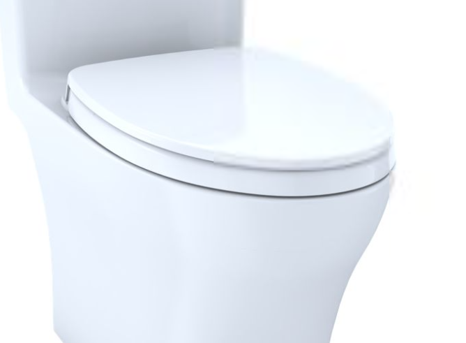 a white toilet with a white seat on a white background .