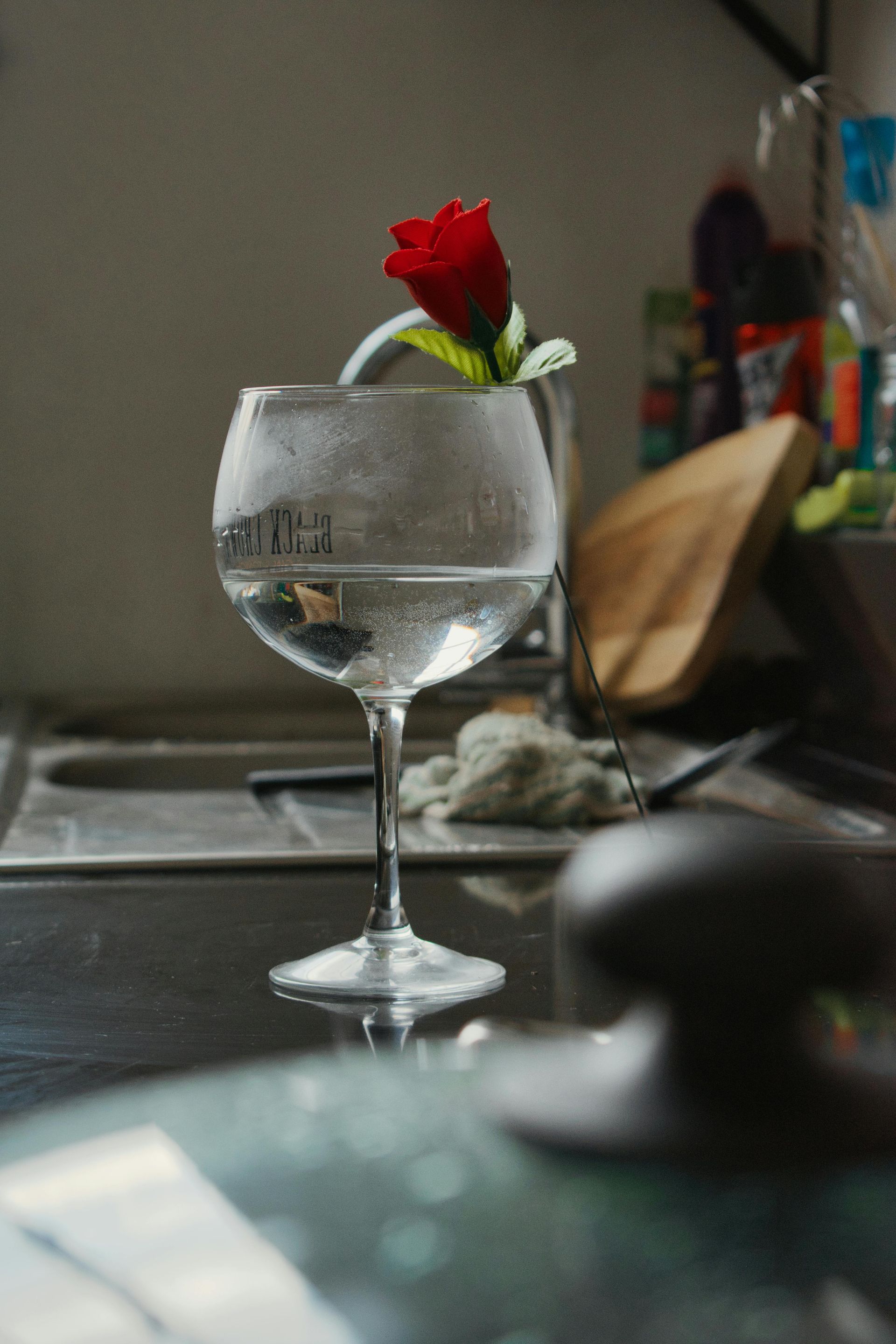 a wine glass with water in it