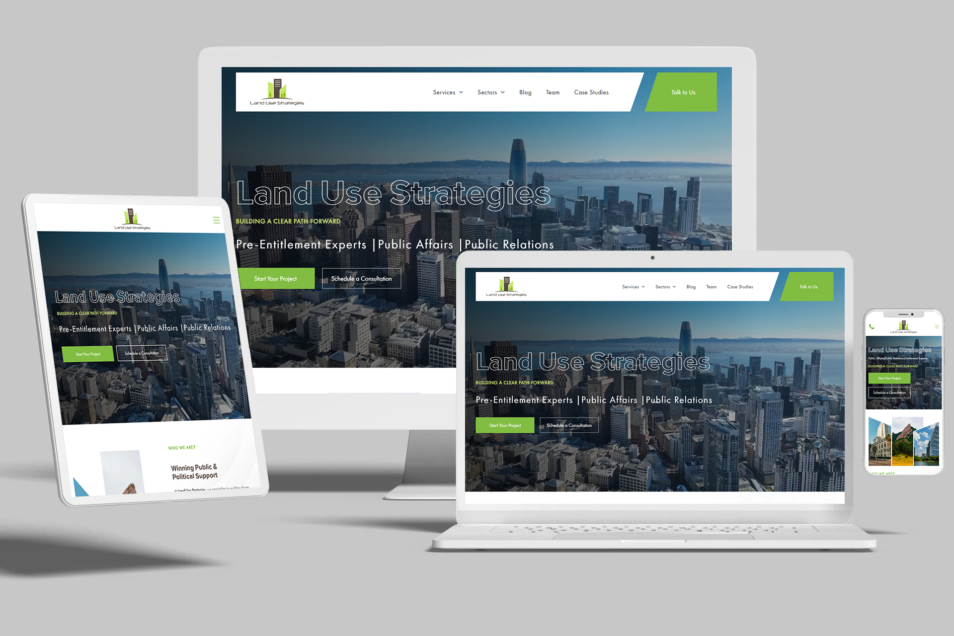 Website design mockups on different devices, showcasing a cityscape background.