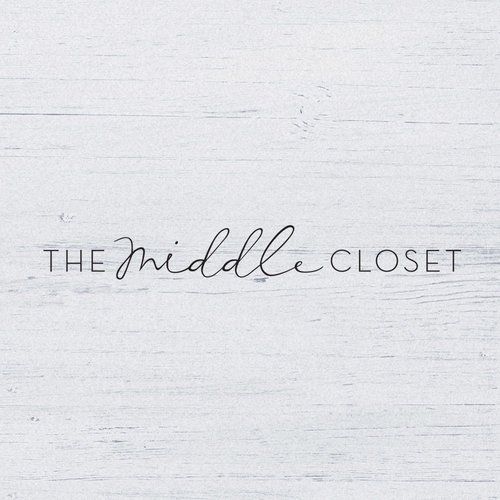The middle closet logo is on a white wooden background.