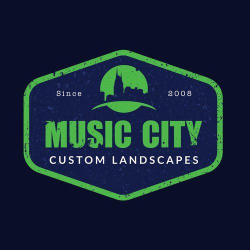 A logo for a company called music city custom landscapes.