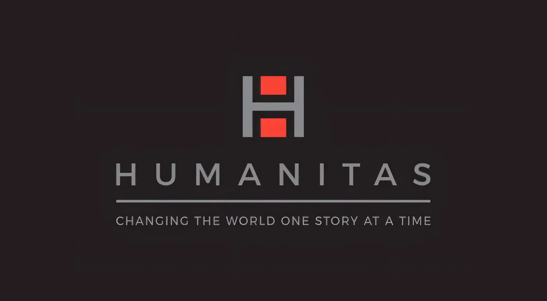 A logo for humanitas changing the world one story at a time
