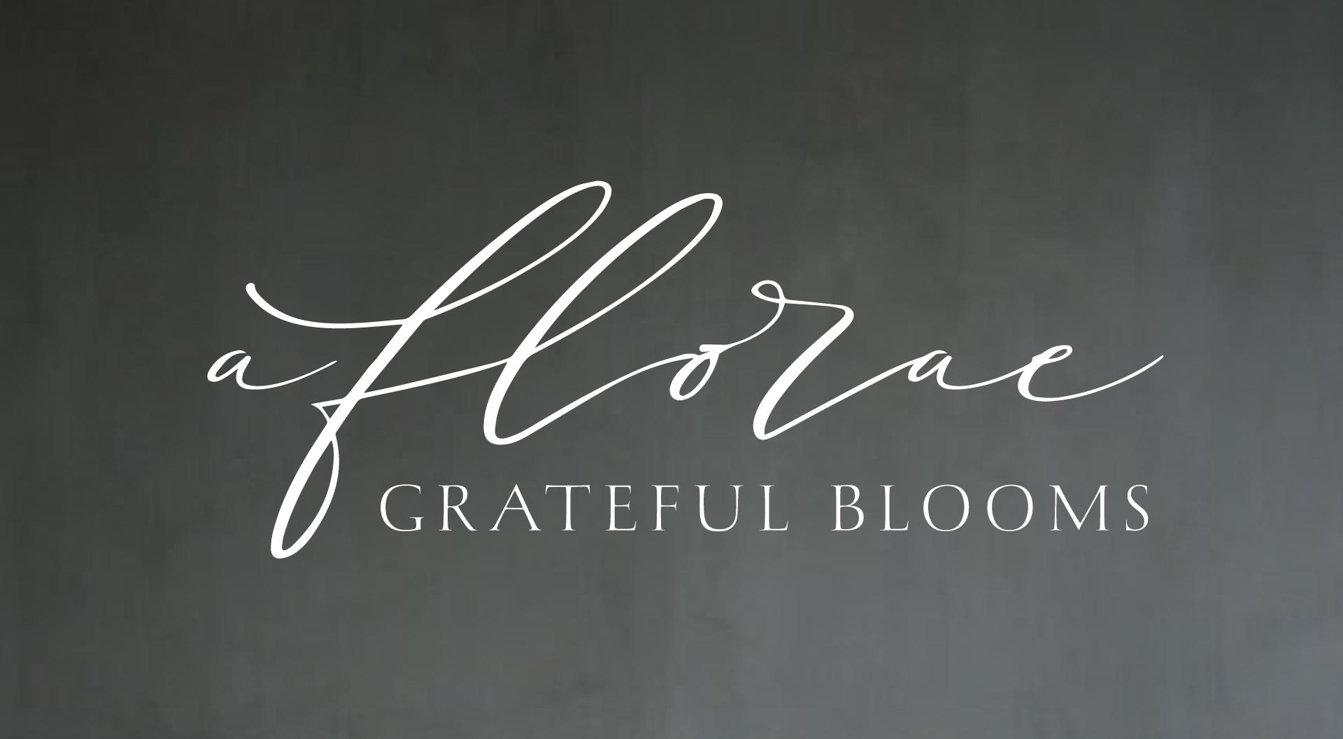 A chalkboard with the words a flower grateful blooms on it