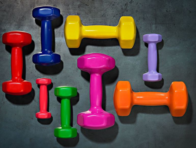 color full different size of dumbbells
