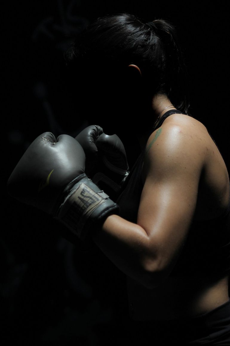 Woman is in boxing pose