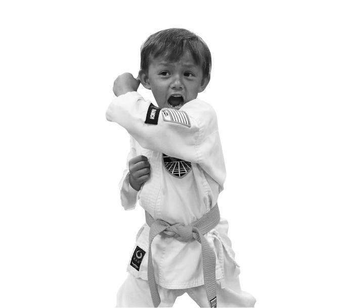 Kids in his karate stance