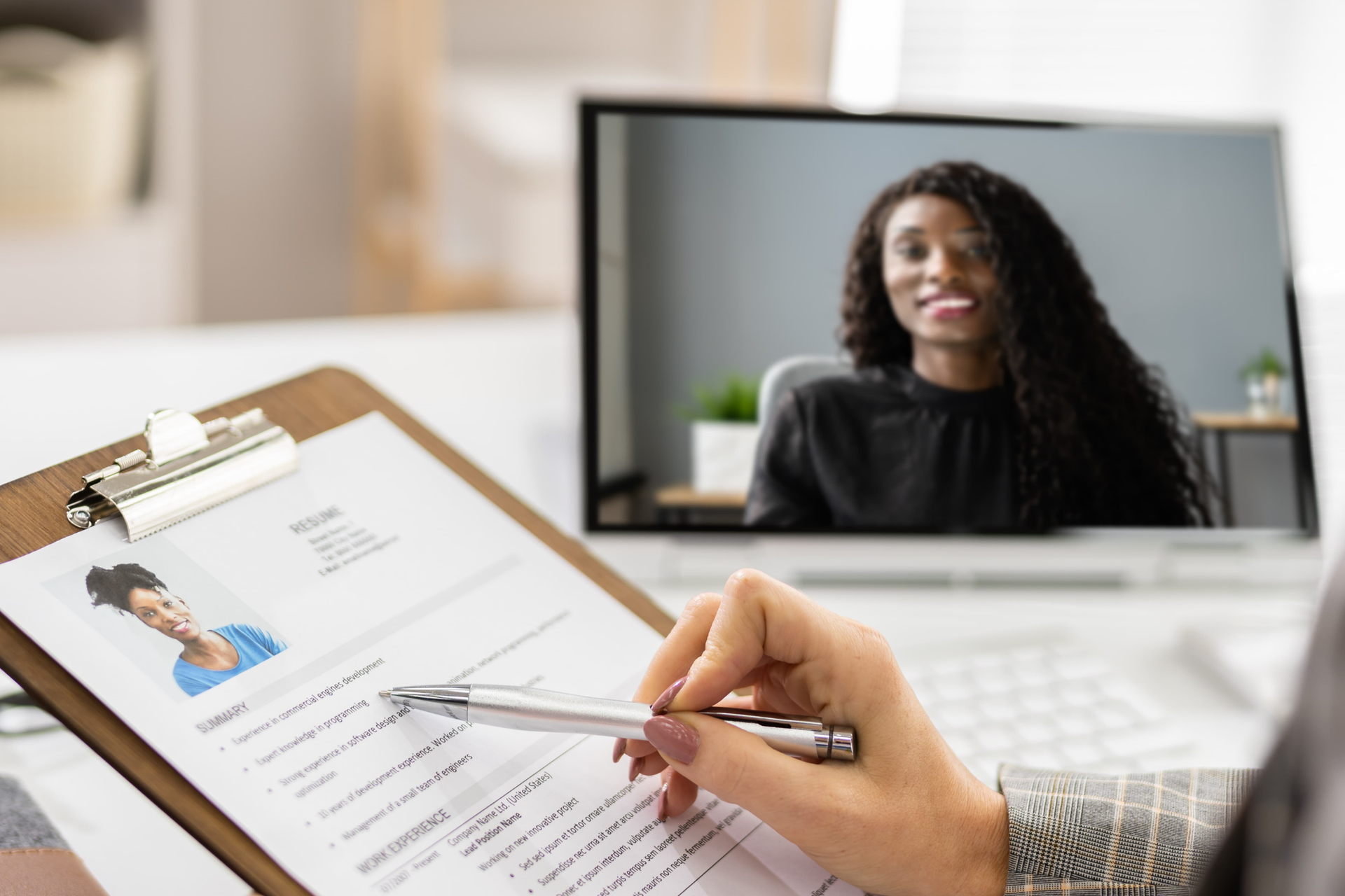 Client interviewing a Virtual Assistant on a laptop.