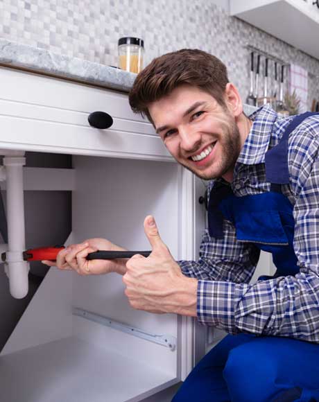 Plumber Fixing the Sink — Lubbock, TX — Ricky Boyce Plumbing, Heating & Air Conditioning