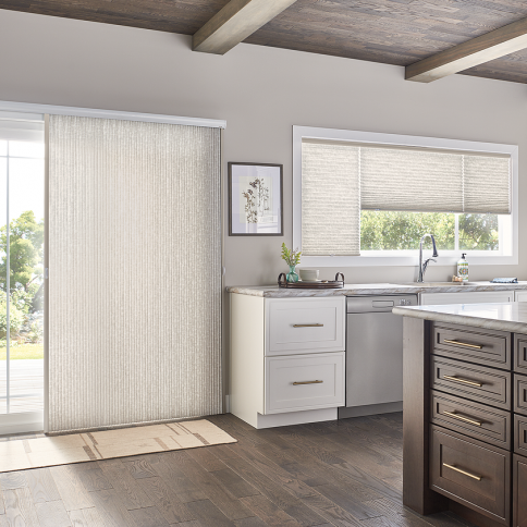 Kitchen with sliding door and window blinds; light color scheme, wooden floor.