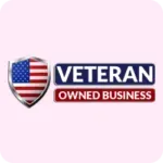 A veteran owned business logo with an american flag on a shield.