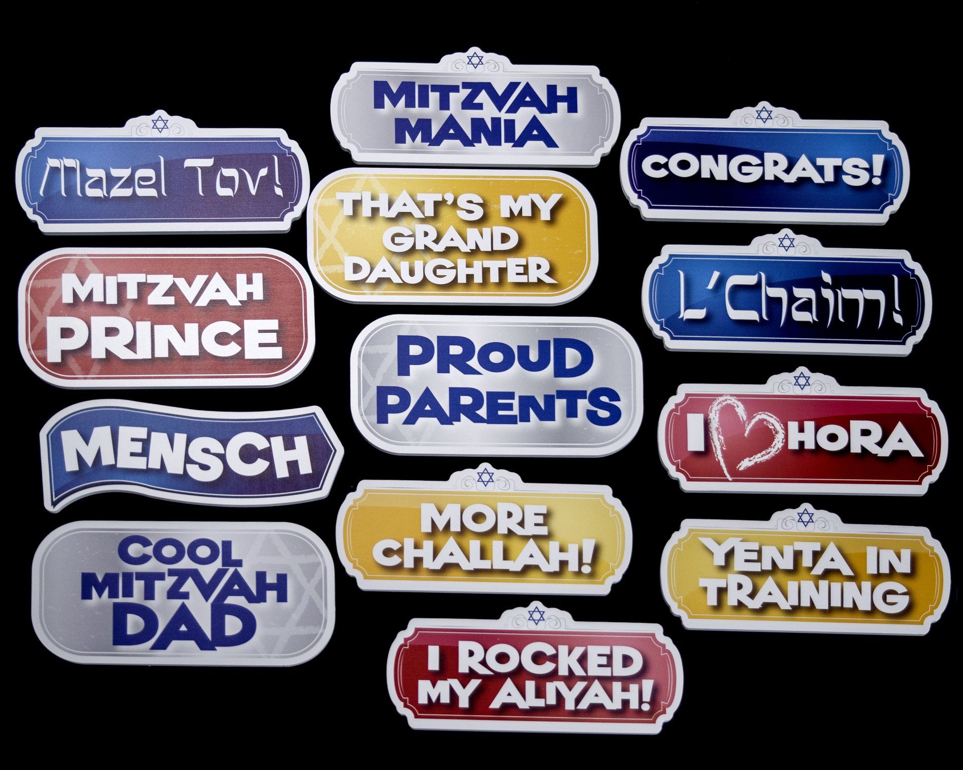 A bunch of stickers that say mitzvah on them