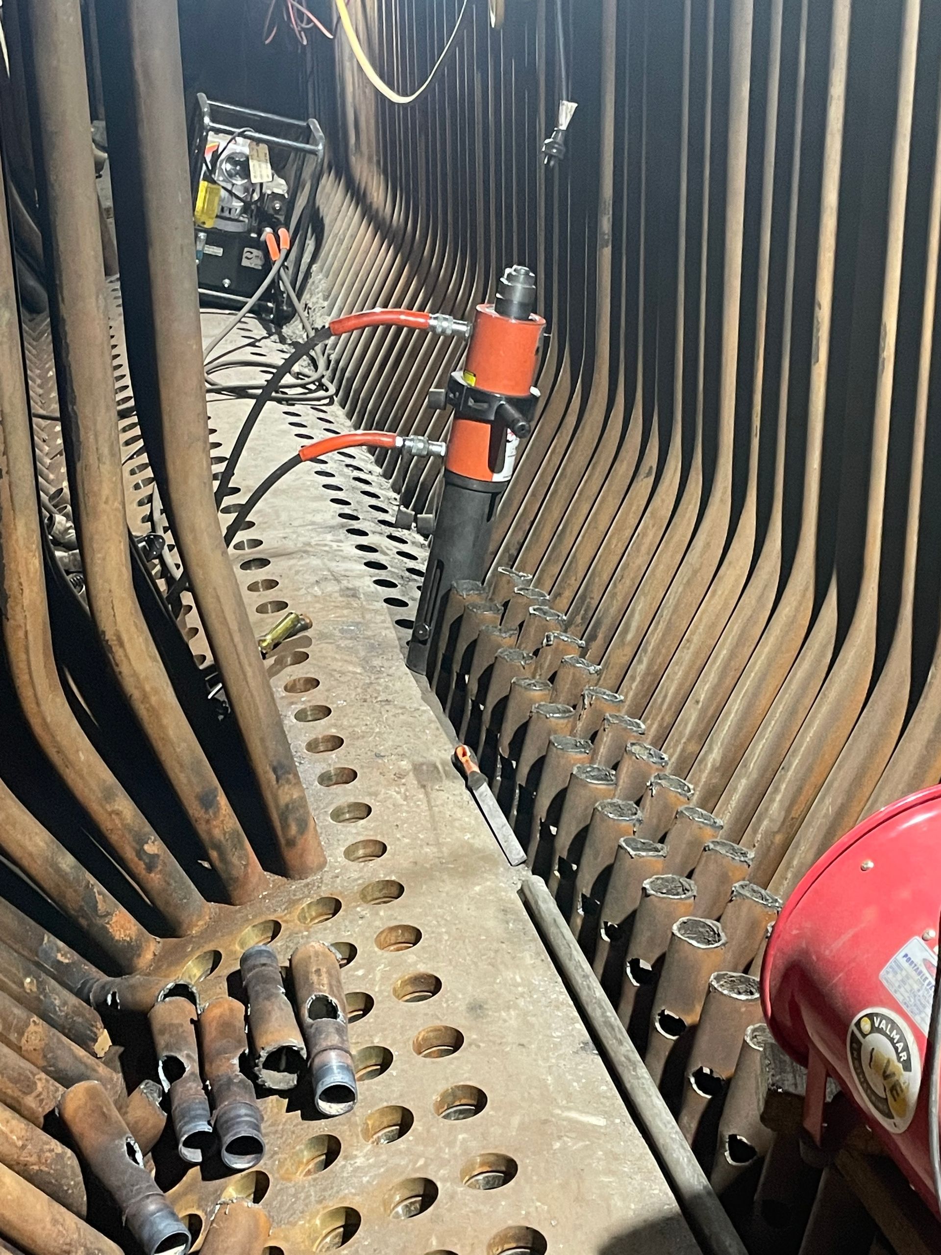 A machine is sitting on a table in a factory.