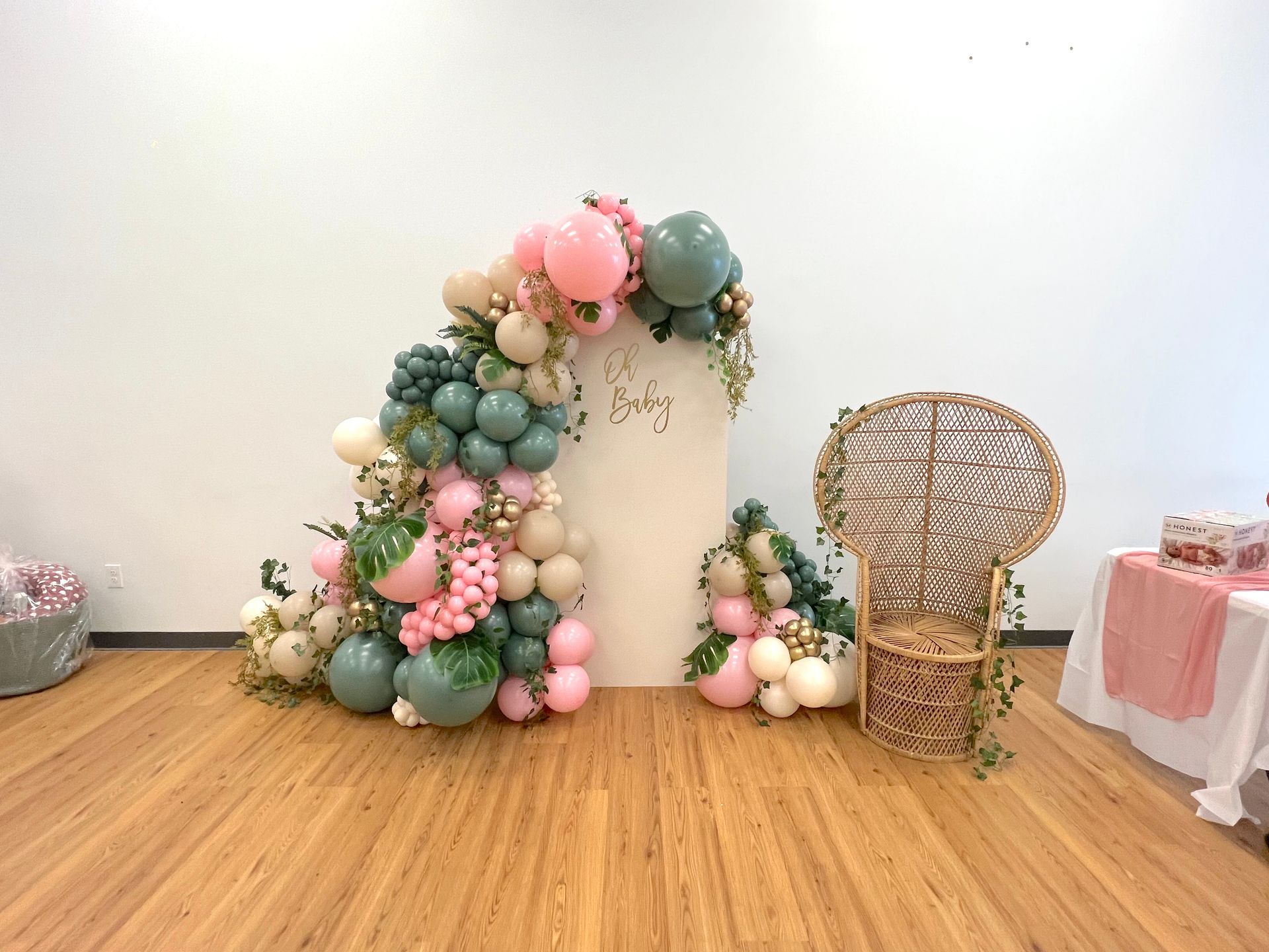 A room filled with balloons and a chair.