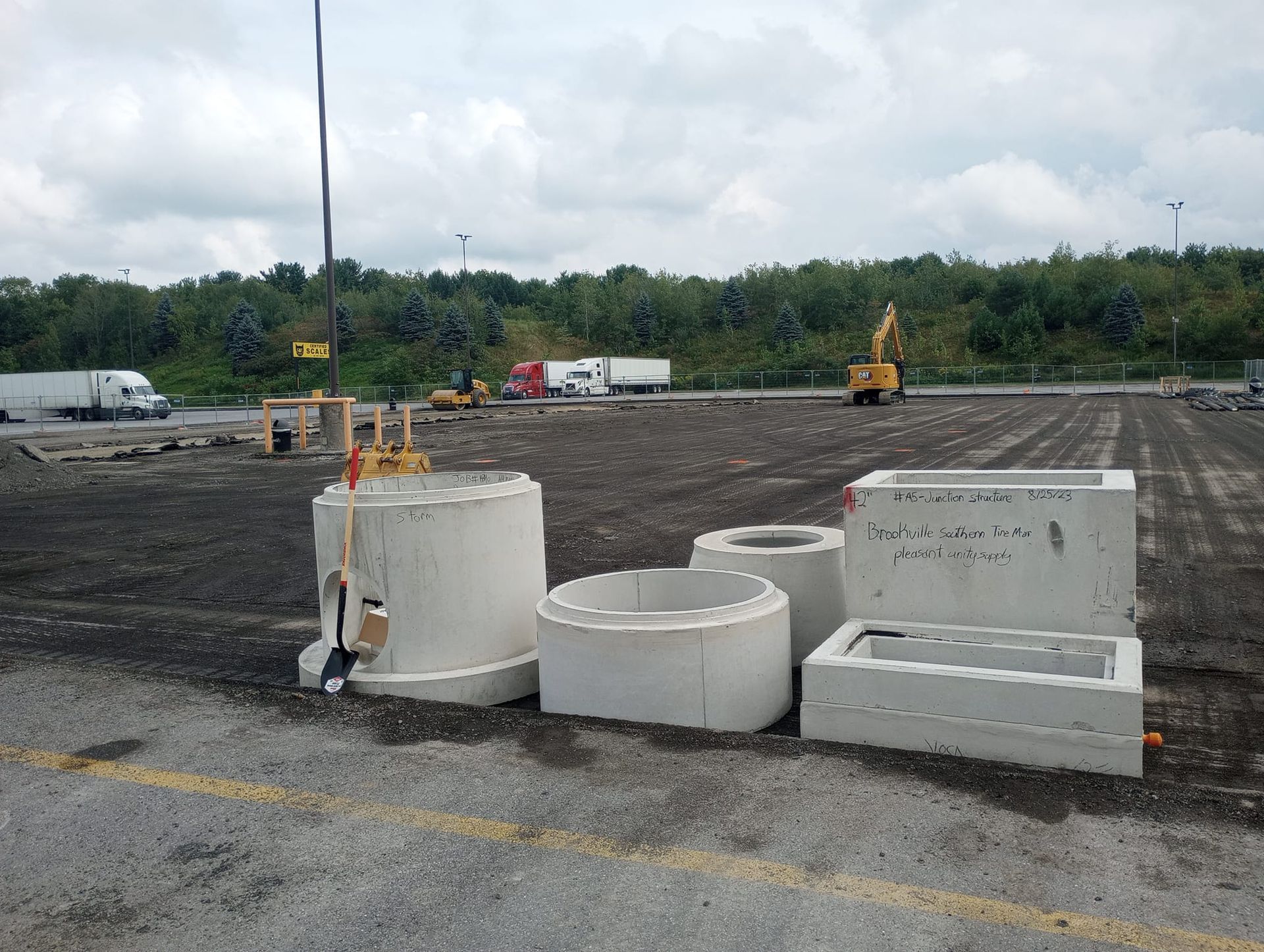 A construction site with a lot of concrete pieces