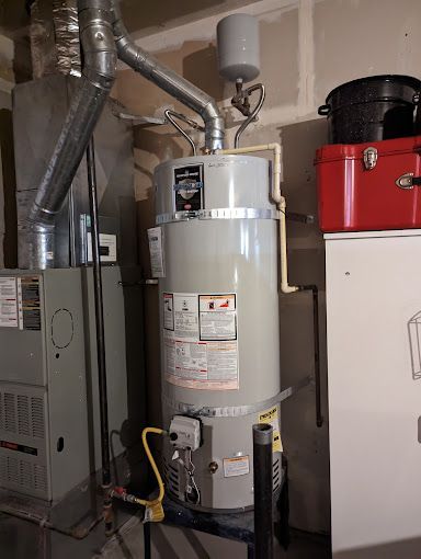 Checking Water Heaters — Monroe, WA — Hudy Plumbing & Heating Inc