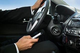 Man Texting While Driving - Personal Injury in Marion, IL Man Texting While Driving - Personal Injury in Marion, IL