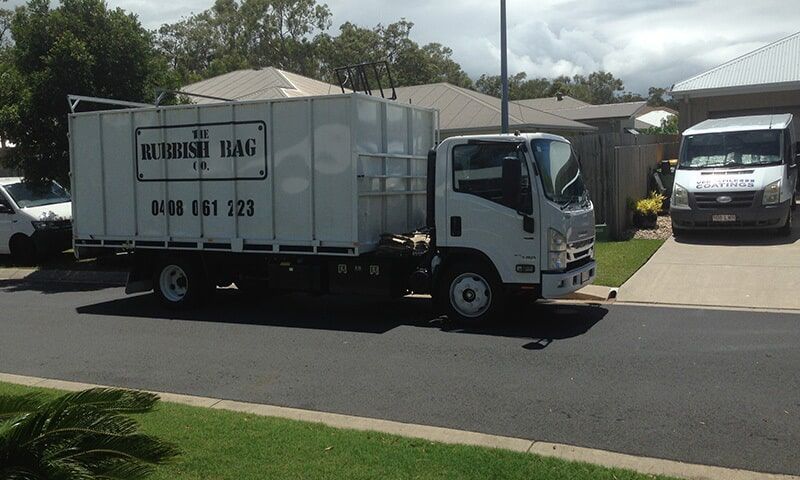 Trash Truck in Residential Area — The Rubbish Bag Co in Sunshine Coast, QLD
