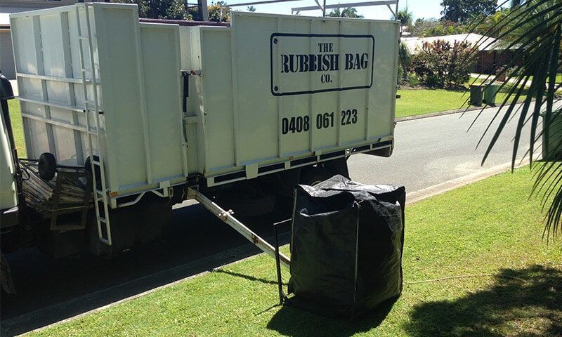 Trash Bag About to be Lifted by a Trash Truck — The Rubbish Bag Co in Sunshine Coast, QLD