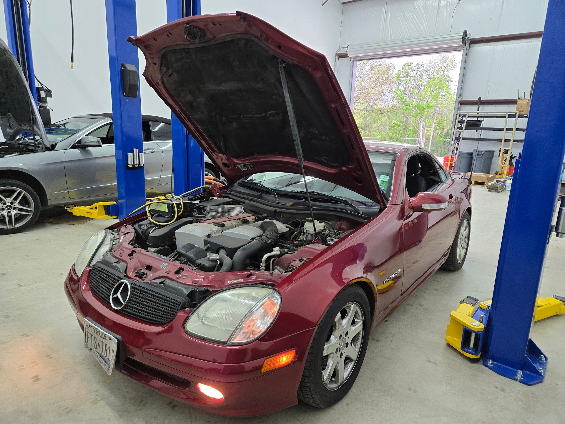 Mercedes Benz Sedan Undergoing Engine Diagnostics On Lift | MB1 Autohaus