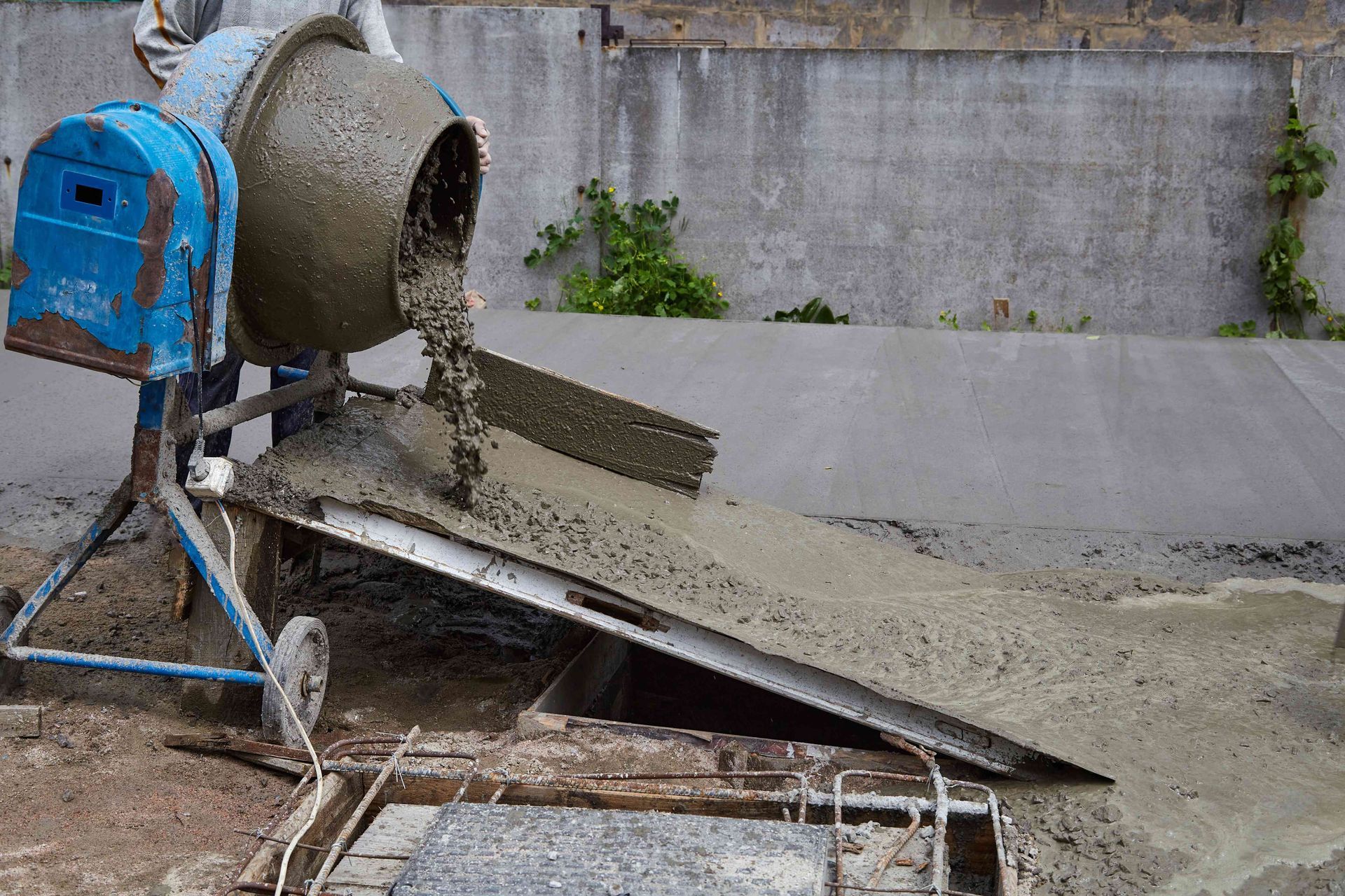 Concrete being poured out of mixer
