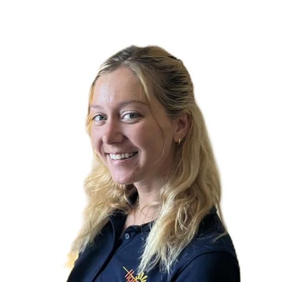 A man wearing glasses and a black shirt smiles for the camera