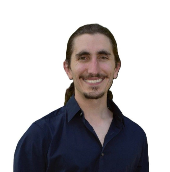 A man wearing glasses and a black shirt smiles for the camera