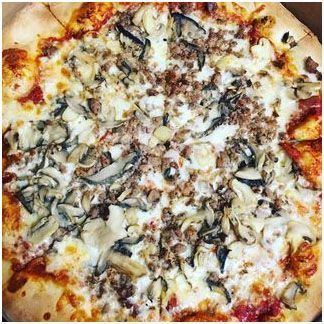 A Pizza with mushrooms and homemade sausage